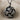 Gordian Knot Pendant, oxidized, product photo on linen