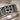 Gemini Twins Zodiac Ring, close-up view showing twins and zodiac glyph relief