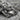 Jesus Icon Cross Pendant, oxidized silver, close-up of facial relief and crown of thorns