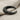 Bull horn cuff earring, black rhodium, side profile view on fabric