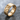 Double Venus Ring, gold vermeil, angled product view on stone surface