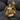 Chained Prometheus Ring, gold vermeil, front view on textured stone