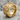 No Days Off Ring in gold vermeil, angled view on rock