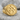 Interlocking Mars Ring, gold vermeil, product photo on stone