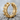 Gear hoop earring in gold vermeil, angled product photo on stone