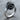Abstract Swirl Ring, oxidized silver, angled view on wood surface