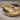Ocean Wave Pendant, two-tone finish, close-up of wave relief detail