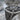 Gothic Floral Cross Ring, oxidized silver, angled close-up of face and shoulder