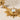 North Star Sunburst Drop Earring, gold vermeil, close-up view