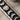Moon phase bar pendant, oxidized silver, close-up of moon phases