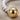 Open Rope Sphere Ring, two-tone finish, close-up of spherical finial