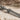 Echoes in Eternity Gladius Pendant, oxidized silver, close-up of blade and inscription