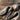 Bird Letter M Pendant, oxidized silver, close-up of bird heads and wings