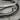 Double Rail Ichthys Cuff Earring, oxidized silver, close-up of fish motif and wire rails