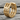 Industrial Rivet Hoop Earring, gold vermeil, angled side view on slate surface