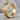 Double Grooved Hoop Earring, gold vermeil, front view on stone