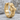 Gothic Cross Hoop Earring, gold vermeil, product photo on stone
