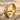 Cracked Band Ring, gold vermeil, angled product photo on sand