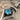 Blue Stone Kite Pendant, close-up of center stone setting