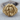 Eve Serpent Ring, gold vermeil, front angle on wood