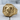 Octagonal Ram Head Ring, gold vermeil, front view on wood slab