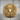 Saint Hubertus Signet Ring, gold vermeil, front view on wood