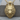 Lone Wolf Pendant, gold vermeil, product photo on wood base