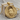 Winged Owl Medallion Pendant, gold vermeil, product photo on wood block