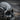 Ribbed Biomechanical Skull Ring, oxidized silver, close-up of ribbed cranium and eye socket detail