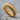 Ribbed Band Ring, gold vermeil, product photo on stone surface