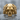 Foliate Skull Ring, gold vermeil, product photo on wet stone