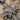 Ribbon cross pendant, close-up of center ribbon detail