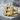 Bitcoin Silhouette Ring, gold vermeil, front angled view on concrete