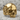 Baroque Flourish Skull Ring, gold vermeil, product photo on stone