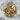 Drama masks ring, gold vermeil, front view on stone