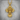 Jesus Head Cross Pendant, gold vermeil, product photo on display plinth