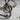 Treble Clef Ring in oxidized silver, close-up of musical note contour