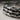 Three Row Wedge Ring in oxidized silver, close-up of overlapping wedges