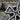 Iron Cross Pendant, oxidized silver, close-up of textured arm and bail