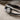 White Topaz Contour Arch Ring, oxidized silver, close-up of bezel setting and stone