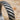 Diagonal Striped Ring, oxidized silver, close-up of raised angled grooves