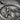Undoer of Knots Medal Pendant, oxidized silver, close-up of ribbon relief