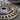 Nazar Sunburst Frame Pendant, oxidized finish, close-up of eye motif