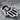 Hamsa Open Palm Earring, oxidized, close-up of openwork palm and eye detail