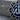 Allah Enamel Rosette Pendant, oxidized silver, close-up of calligraphy and enamel