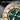 Four Leaf Enamel Medallion Pendant, oxidized, close-up of green enamel
