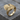 Raven Feather Fan Ring in gold vermeil, product photo on rustic wood