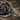 Rose Thorn Huggie Earring, oxidized, close-up view of rose and leaf details