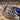 Lapis Spiral Shell Earring, oxidized silver, close-up of shell ridges and lapis stone