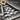 Masonic Mosaic Stair Lapel Pin, oxidized silver, close-up of checkerboard steps